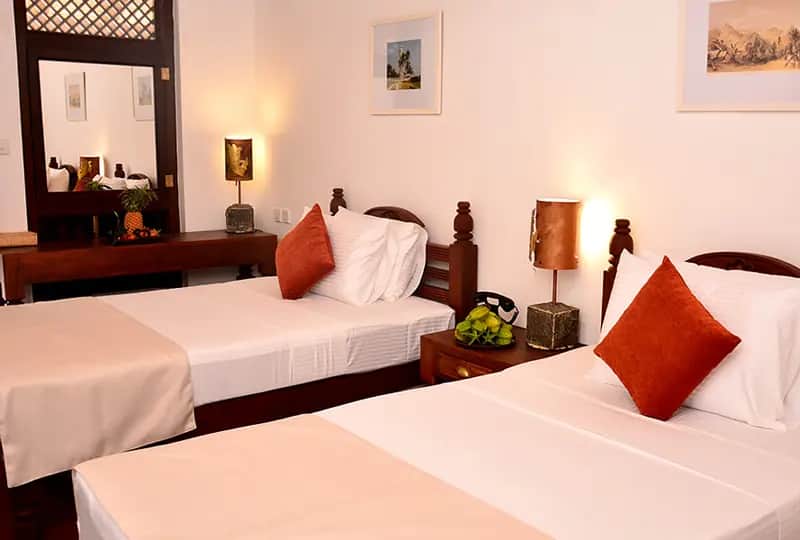 Deluxe Rooms at The Heritage Galle Fort, one of its room types
