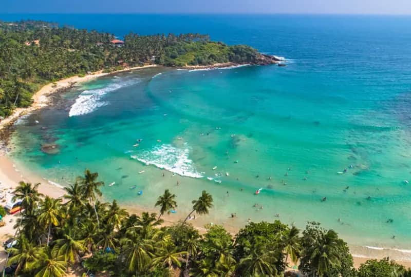 A view of Surfing in Hiriketiya, Sri Lanka
